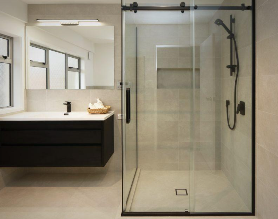 Modern bathroom shower enclosure with glass shower doors